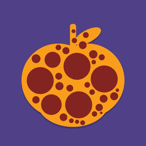 An orange apple covered in dark red dots, on violet